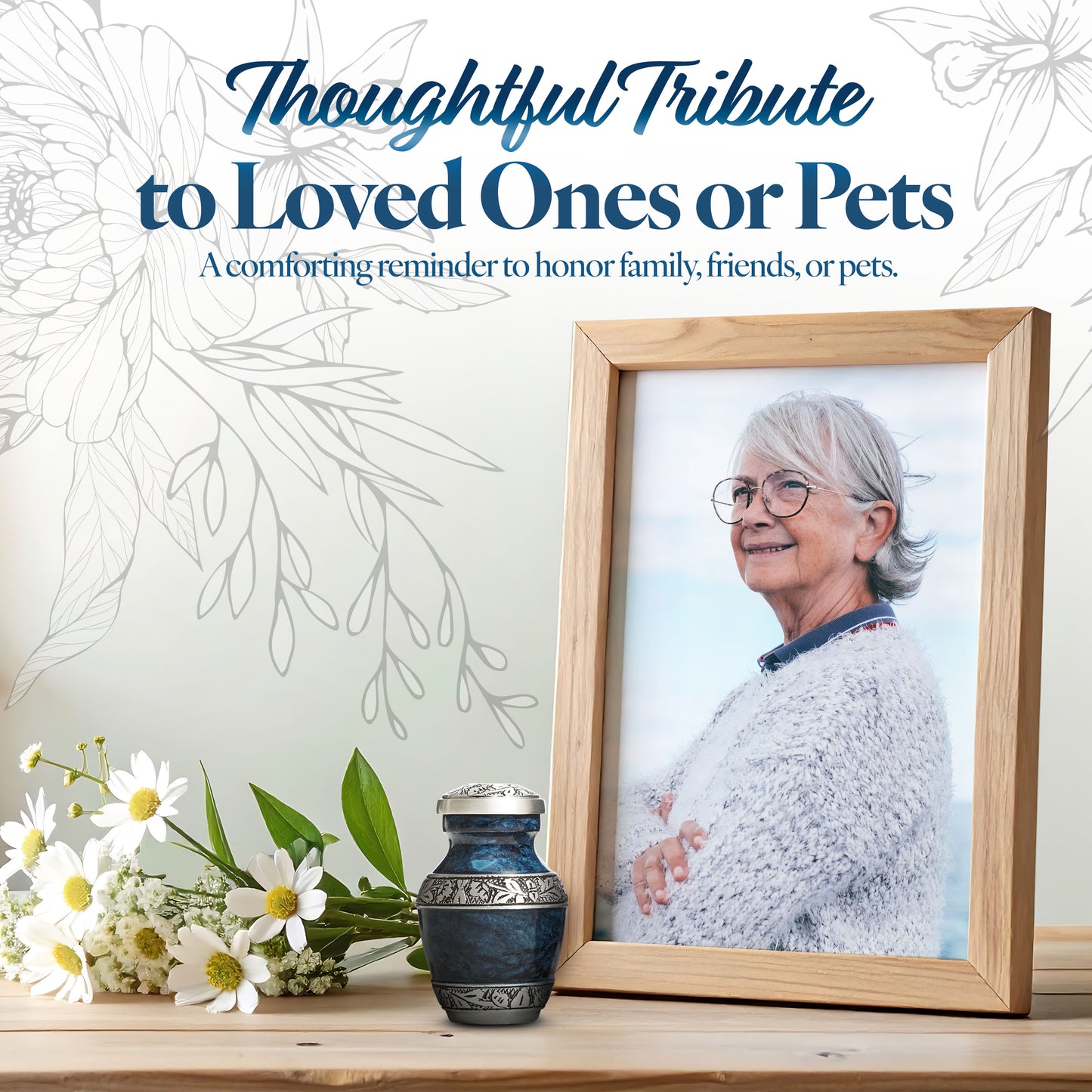 Blue keepsake urn for human ashes or pet ashes placed beside a framed photo as a meaningful tribute